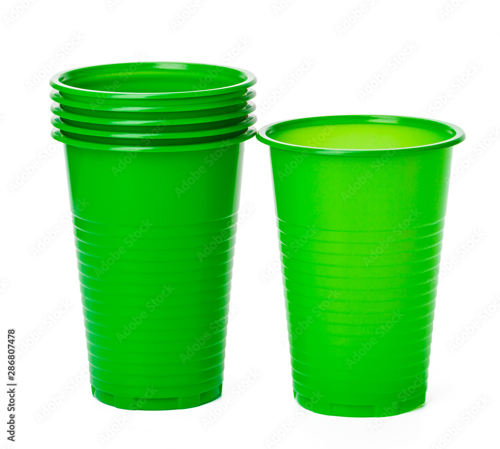 Close up of plastic cups for drinks isolated on white Close up of plastic cups for drinks isolated on white