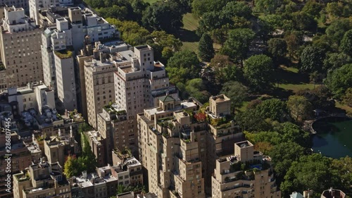 NYC New York Aerial v121 Short panning birdseye view of Central Park Conservatory Water and Upper East Side residential - October 2017 photo