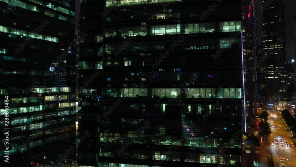 night illumination singapore city downtown office buildings traffic street aerial panorama 4k night illumination singapore city downtown office buildings traffic street aerial panorama 4k