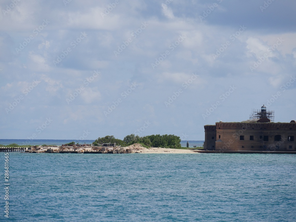 Beach area at the back side of Fort Jefferson, a historic military fortress at the Dry Tortugas National Park, Florida.