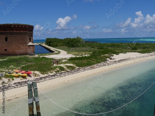 Scenic view of the ocean with one side of Fort Jefferson protected by a moat at the Dry Tortugas National Park, Florida. photo