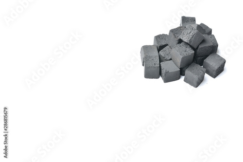 Coconut charcoal for arabic hookah on a white background