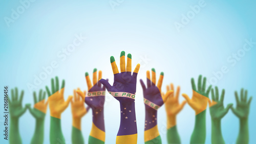 Fotografi Brazil flag on people palm hands raising up for volunteer, voting, help wanted,