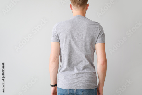 Man in stylish t-shirt on l...