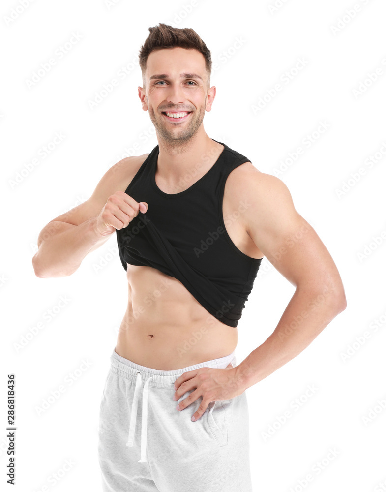 Handsome muscular man on white background. Weight loss concept Handsome muscular man on white background. Weight loss concept