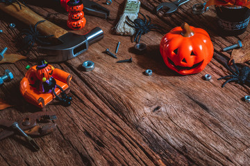 Happy Halloween day with construction DIY handy tools on rusty wooden background concept with copy space.