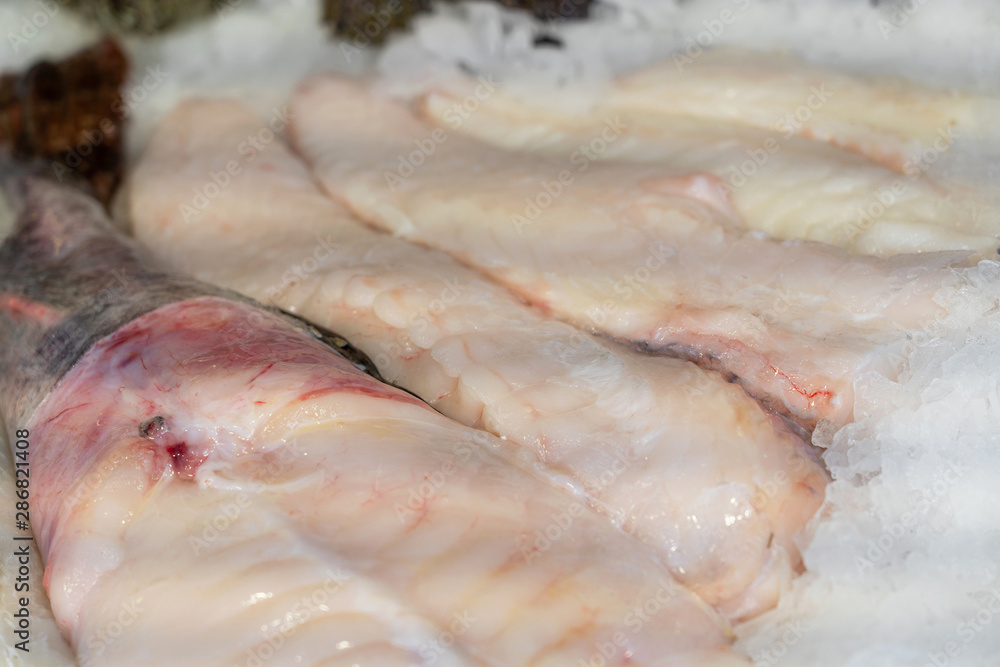 Fresh uncooked fish fillet on the market, Norway Fresh uncooked fish fillet on the market, Norway
