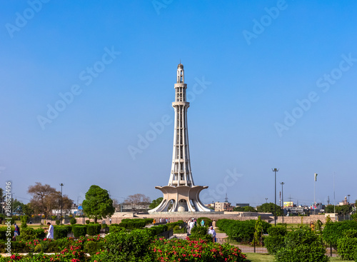 Minar-e-Pakistan, a national monument in Lahore, Pakistan on the blue sky background photo