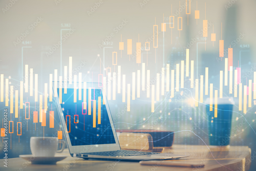 Forex Chart hologram on table with computer background. Multi exposure. Concept of financial markets. Forex Chart hologram on table with computer background. Multi exposure. Concept of financial markets.