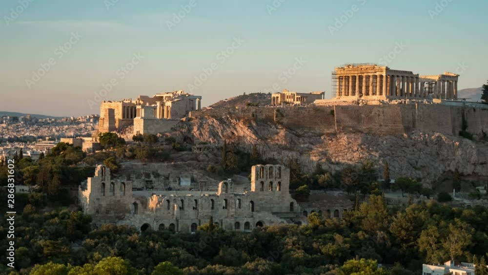 Ancient Athens Acropolis as a timelapse shot with solemn columns in summer Ancient Athens Acropolis as a timelapse shot with solemn columns in summer