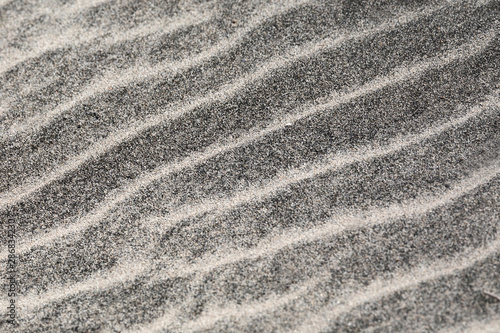 Striature chiare sulla sabbia scura - texture