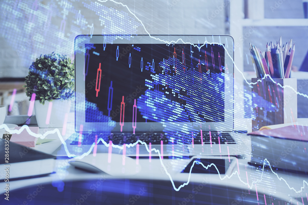 Forex market graph hologram and personal computer on background. Multi exposure. Concept of investment. Forex market graph hologram and personal computer on background. Multi exposure. Concept of investment.