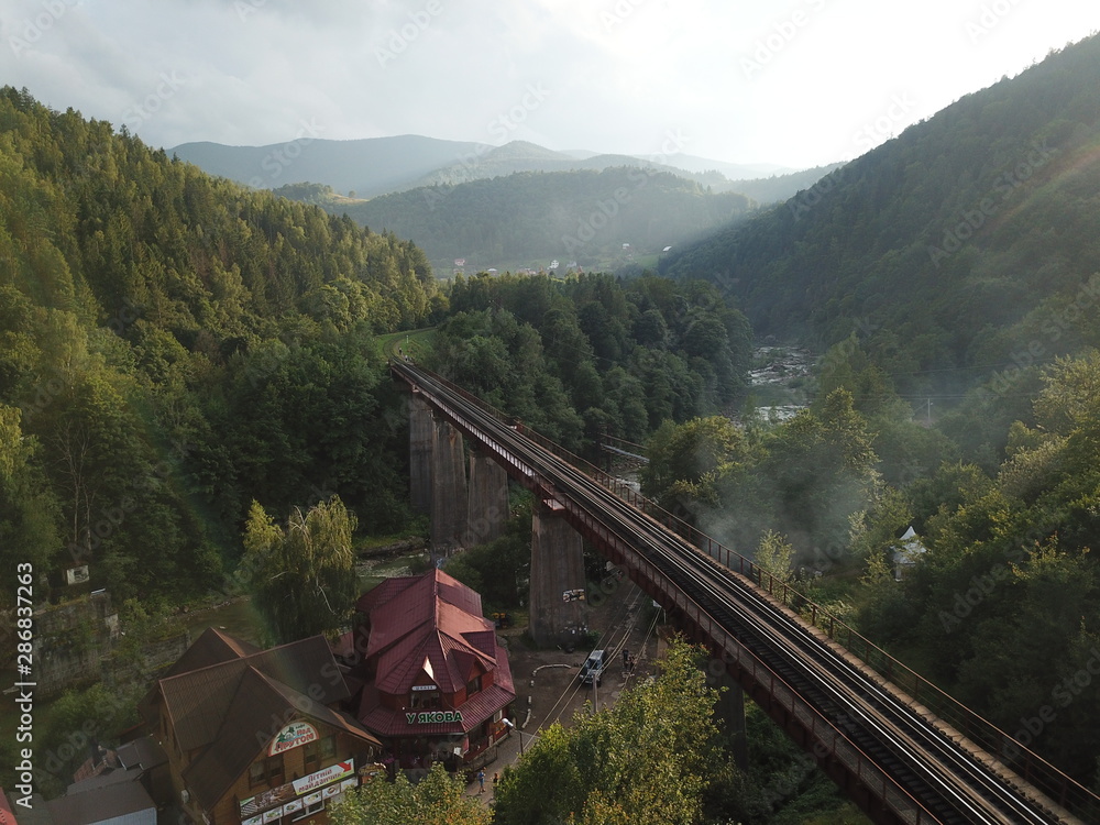 Fototapeta premium Aero lanscape in beautiful ukrainian mountain city Yaremche