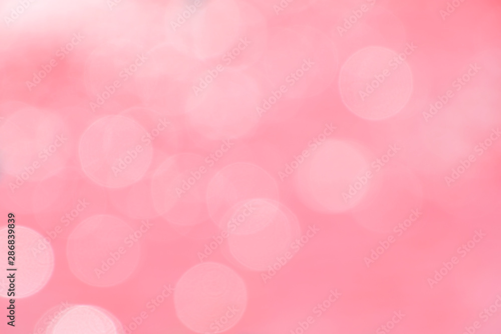 Blurred and defocused background and wallpaper of pool water bokeh and bubbles in rose pink pastel and white colour. 