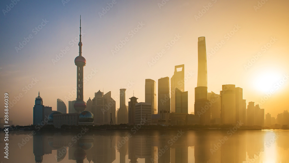 Panoramic view of shanghai skyline and huangpu river in morning with sunrise, China.