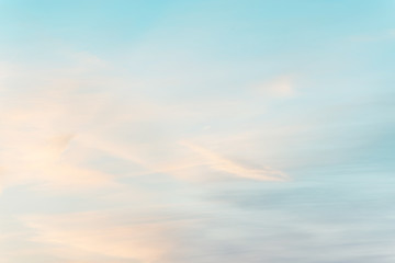 sunset background. sky with soft and blur pastel colored clouds.  gradient cloud on the beach resort. nature. sunrise.  peaceful morning. Instagram toned style