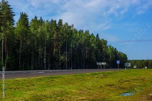 Federal highway through the forests in summer