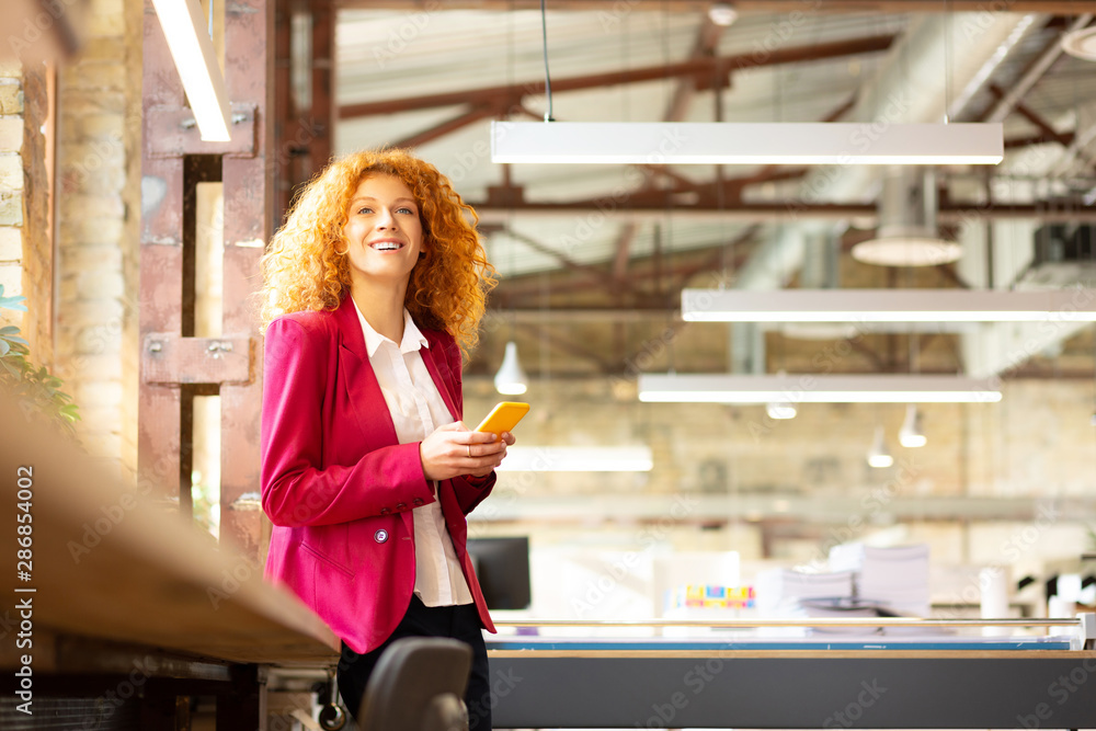 Fototapeta premium Cheerful beautiful woman enjoying break form work