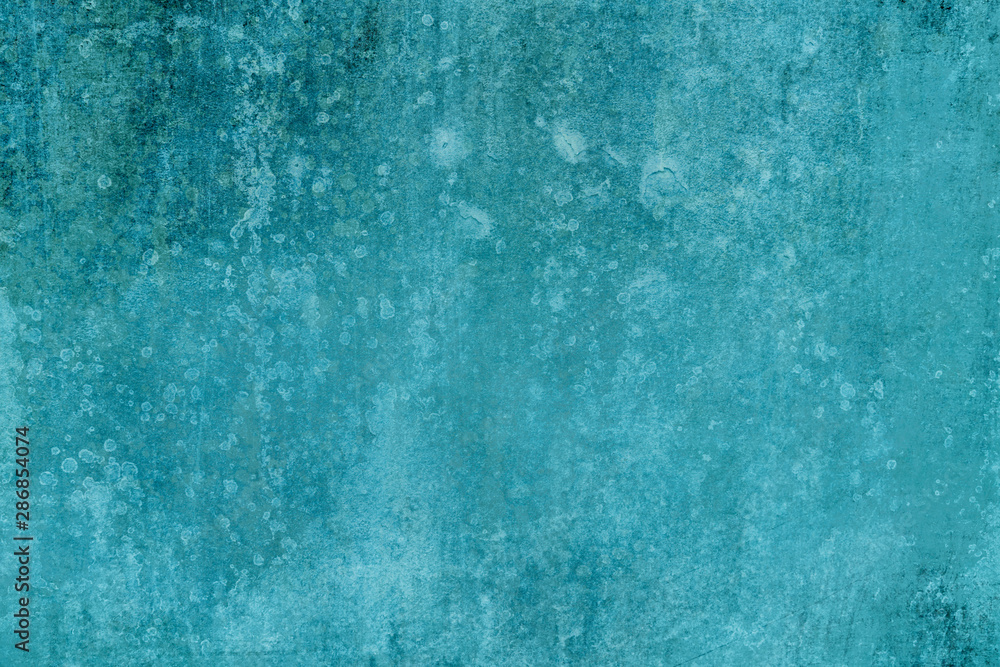 Distressed blue turquoise grungy wall background