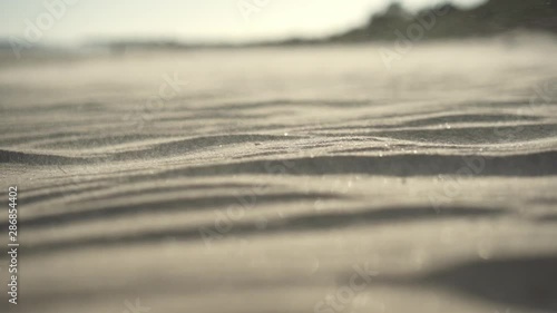 Ocean beach close up shot on the sand - golden hours. Beautiful ocean seascape cinematic shot
