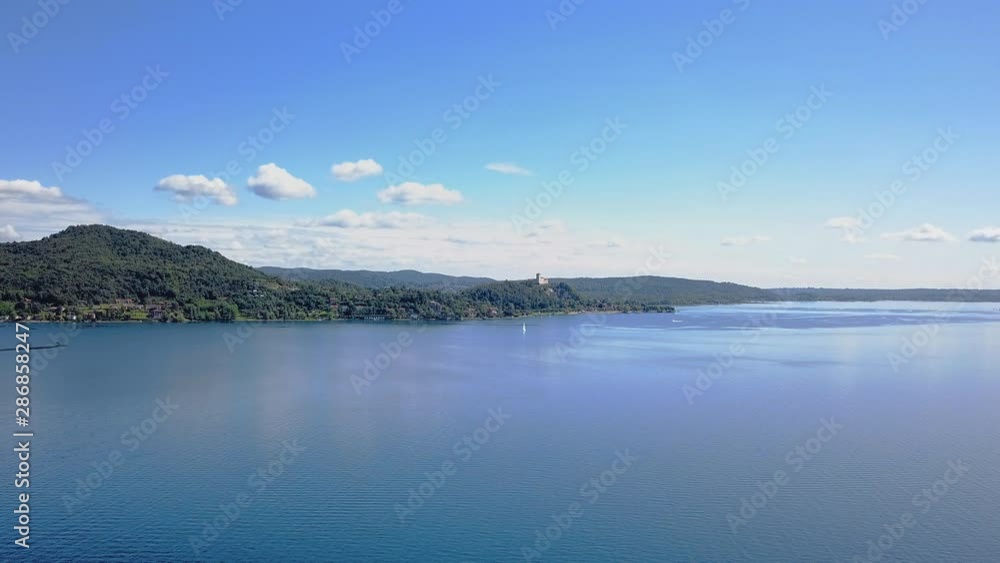 Fresh water lake in Europe aerial shot. Beautiful panorama on a bright summer day Fresh water lake in Europe aerial shot. Beautiful panorama on a bright summer day