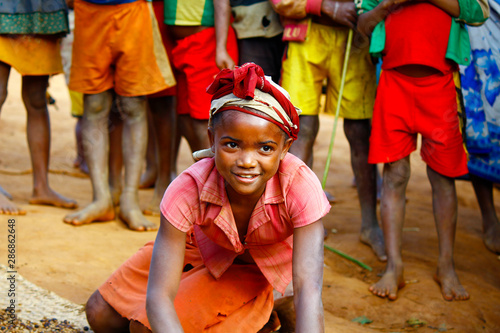 Very pretty malagasy child smiling in the vilage- poverty