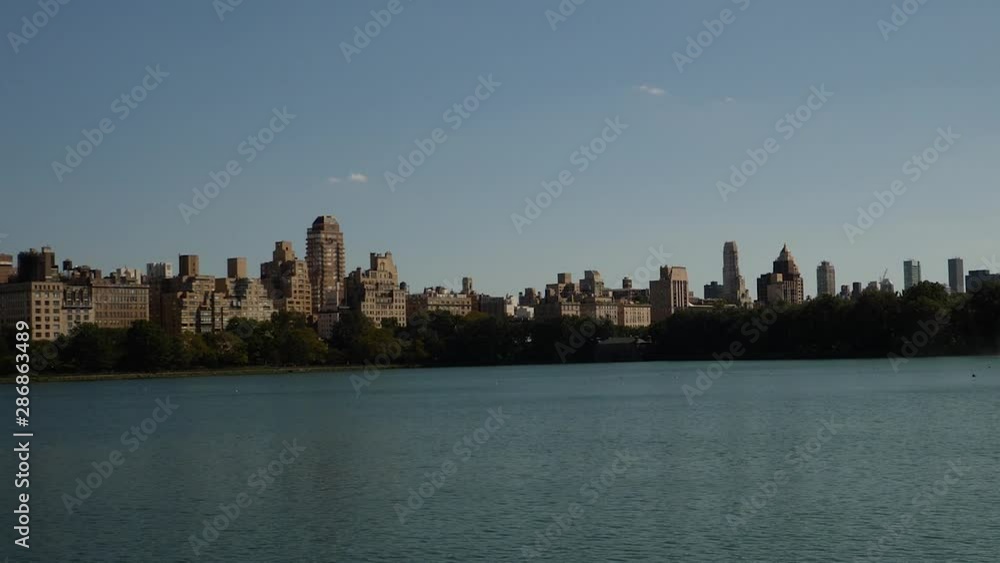 PANNING of buildings of Manhattan with body of water in frorefront. PANNING of buildings of Manhattan with body of water in frorefront.