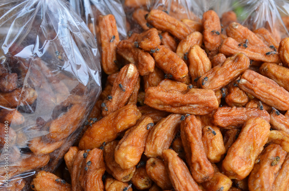 dried bananas (honey baked bananas) with bee,Thai preserved delicious food dried bananas (honey baked bananas) with bee,Thai preserved delicious food