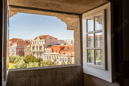 View of Porto from a open window of a ancient building.