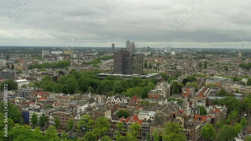 flight over amsterdam city modern downtown aerial panorama 4k netherlands photo