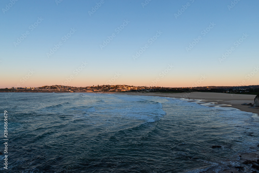 Wide angle view of Curl Curl Beach, Sydney in the morning. Wide angle view of Curl Curl Beach, Sydney in the morning.