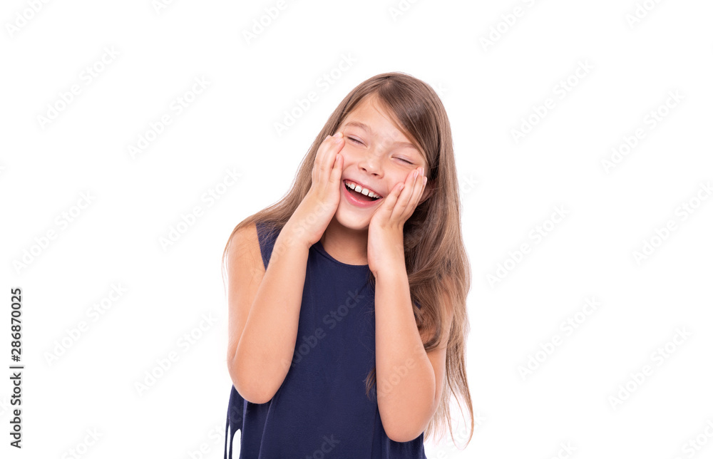 Little girl laughs closing her eyes isolated on a white background. Little girl laughs closing her eyes isolated on a white background.