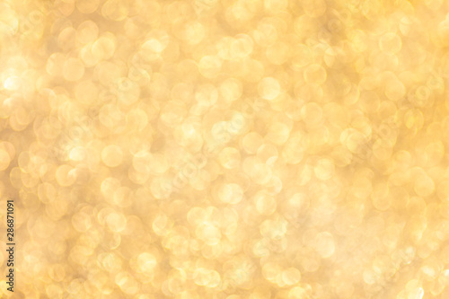 Golden glittering abstract background texture