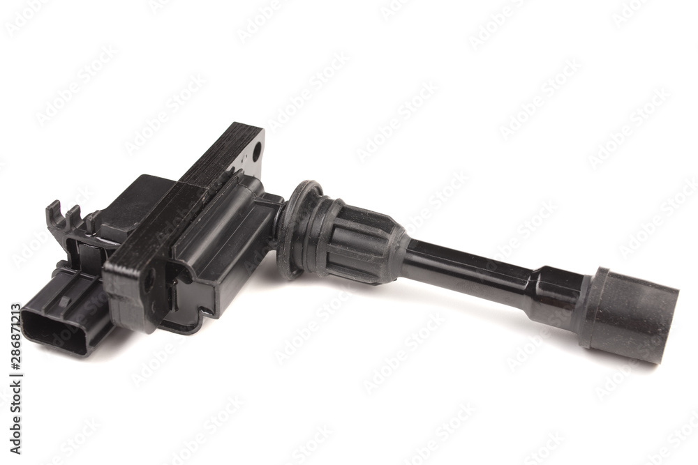 Ignition coil with a japanese car, on a white background. In isolation.