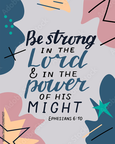 Hand lettering with bible verse Be strong in the Lord and in power of his might on abstract background.