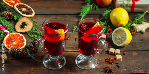 mulled wine, a fragrant drink and a festive mood atmosphere - concept New Year, Christmas. food background. copy space