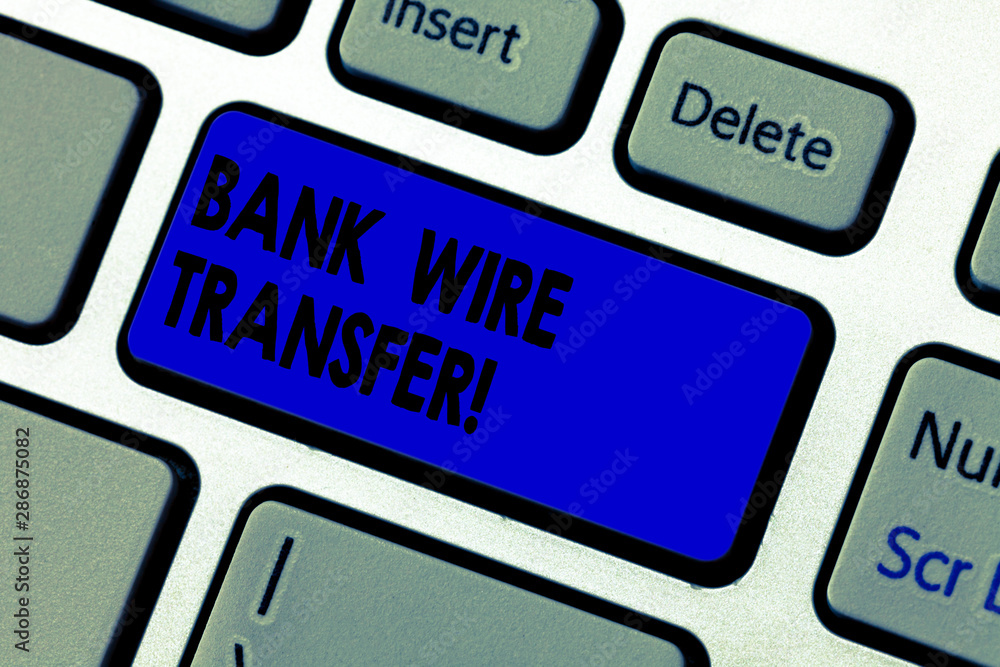 Conceptual hand writing showing Bank Wire Transfer. Business photo text money goes from one bank or credit another using network Keyboard key Intention to create computer message idea Conceptual hand writing showing Bank Wire Transfer. Business photo text money goes from one bank or credit another using network Keyboard key Intention to create computer message idea