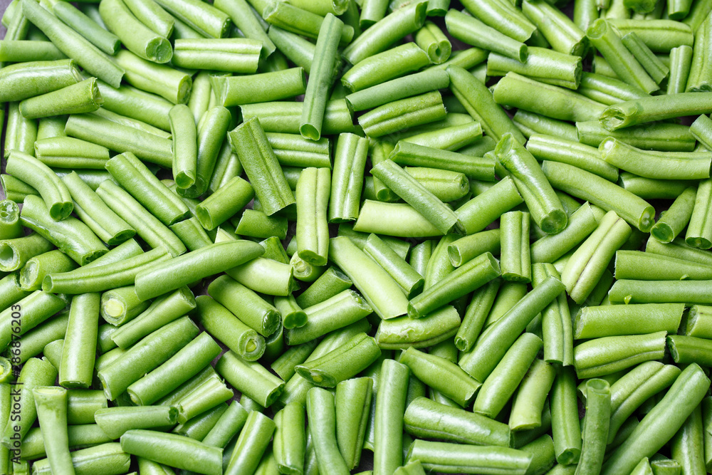 Background of fresh green beans chopped into pieces. Green vegetables.Top frame,horizontal Background of fresh green beans chopped into pieces. Green vegetables.Top frame,horizontal