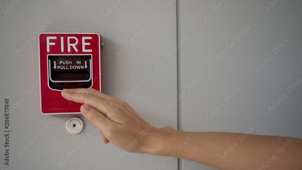 Emergency of Fire alarm or alert or bell warning equipment and hand.In the building for safety. Emergency of Fire alarm or alert or bell warning equipment and hand.In the building for safety.