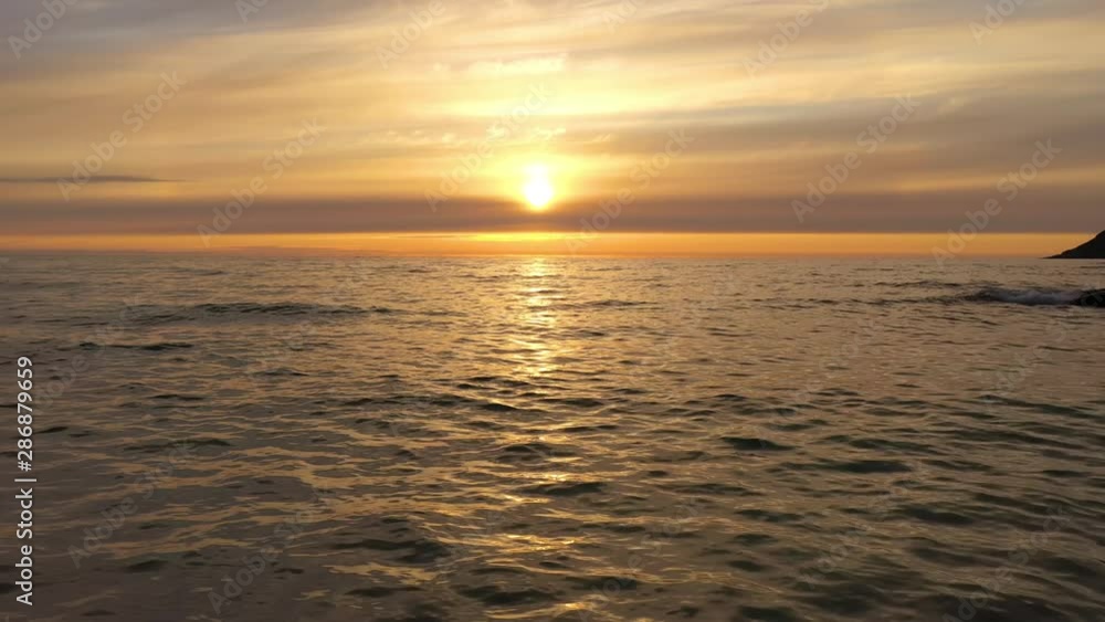 Aerial view of a beautiful sunset over the sea. Beach Lofoten archipelago, Norway. Aerial view of a beautiful sunset over the sea. Beach Lofoten archipelago, Norway.