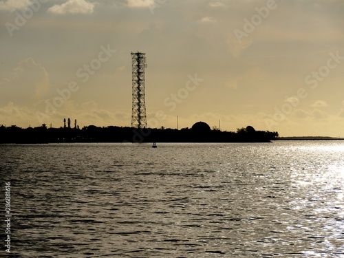 Silhouette of a tower and dock at the Florida keys