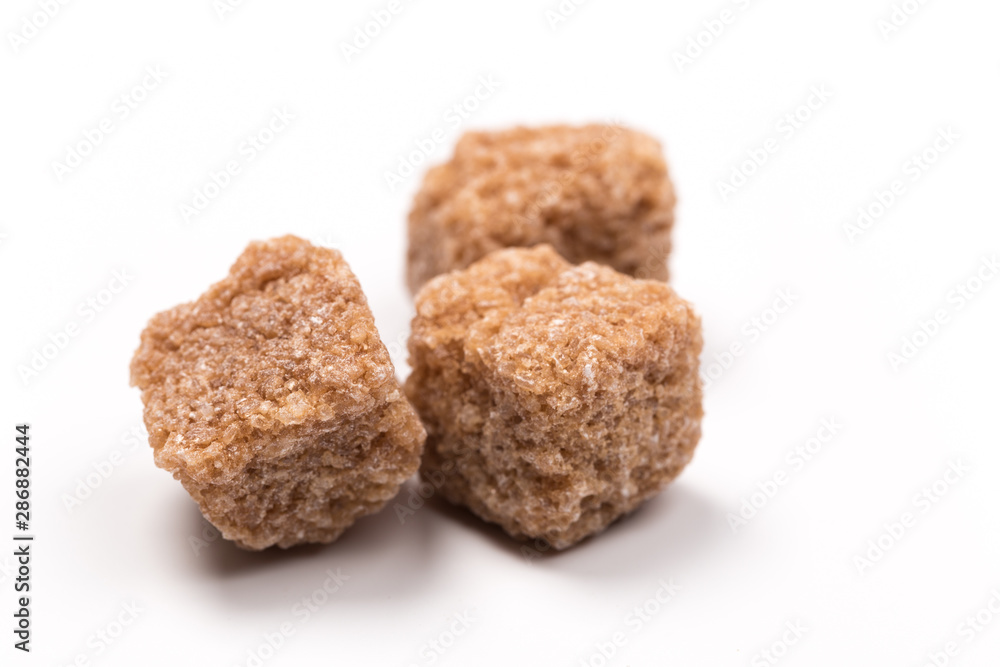 brown sugar isolated on white background. Top view. brown sugar isolated on white background. Top view.
