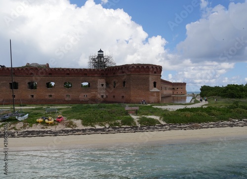 Medium wide shot of one side of Fort Jefferson at the Dry Tortugas National Park, one of the tourist destinations in Key West, Florida.