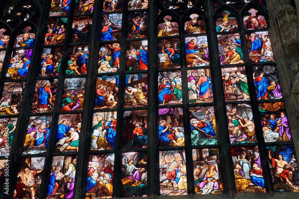 Duomo di Milano interior, stained glass window. Duomo di Milano interior, stained glass window.