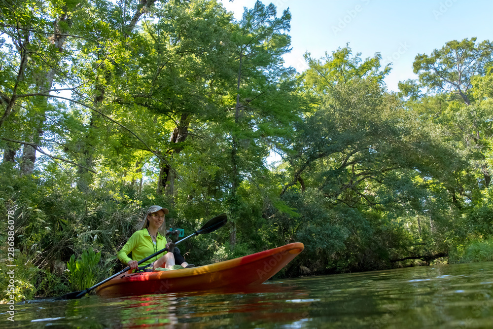 Fototapeta premium Kayaking on Juniper Springs Creek, Florida