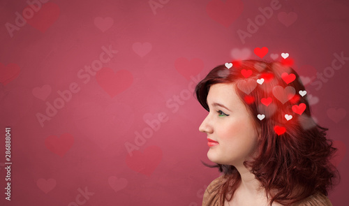 Head with full of love, red background and hearts