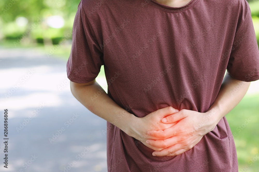 Men suffer from stomach ache; Sick people with stomach pain, gas in the