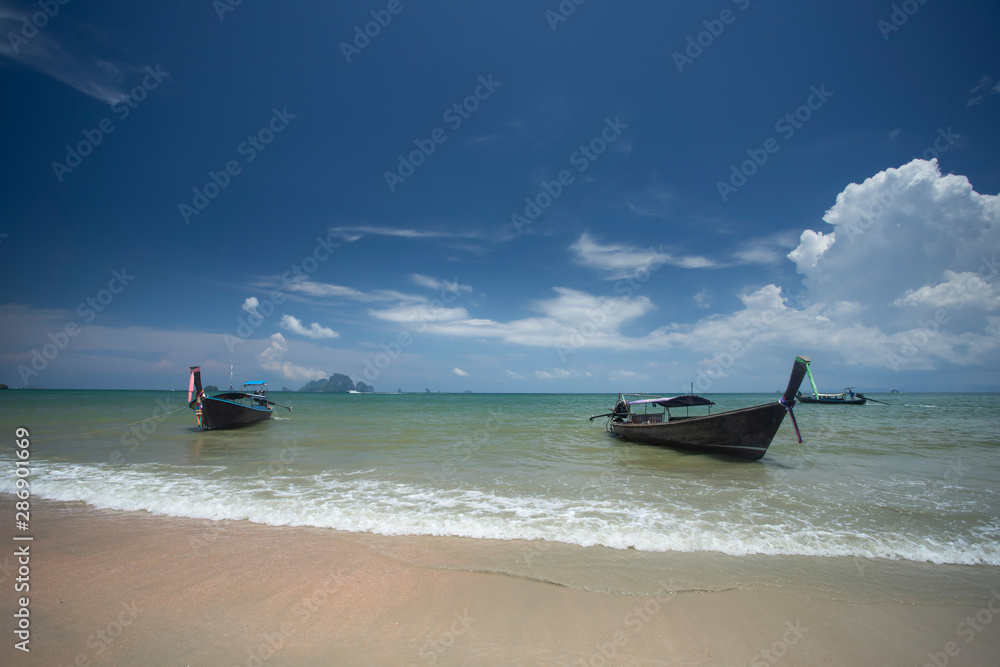Ao Nang Beach with traditional longtail boats, Krabi, Thailand. Ao Nang Beach with traditional longtail boats, Krabi, Thailand.