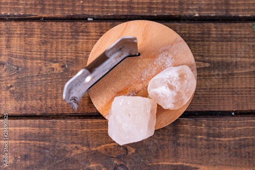 Wallpaper Mural Himalayan Pink salt and salt grinder laying on wooden block Torontodigital.ca