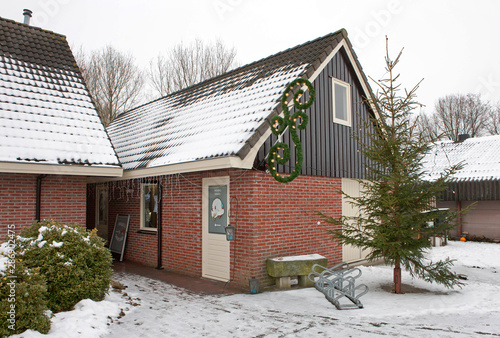 Chickenfarm in winter. Poultry. Snow. Stable. Barn